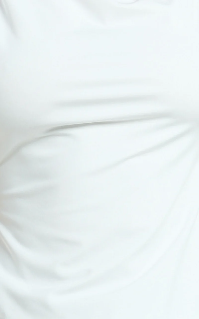 Lausanne Top - Asymmetric Jersey Backless Top With Hardware Detail in Off White