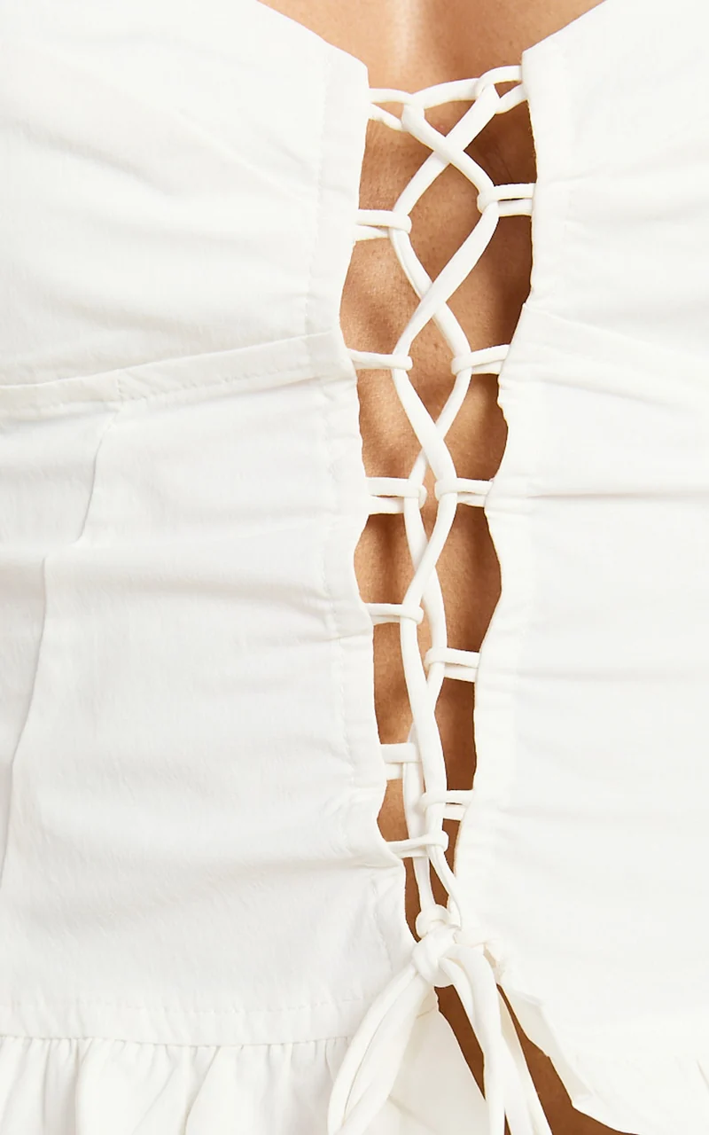 Nani Top - Lace Front Fitted Frill Hem Top in White