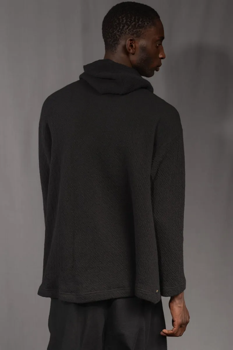 eigensinnig wien | Breed | Exklusiver Strickhoodie aus Merinowolle in Schwarz