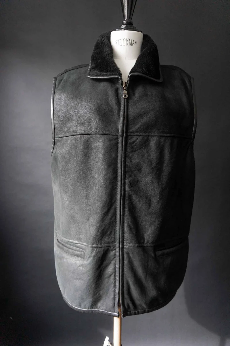 Vintage Echtlederweste mit Lammfellfutter, S–M