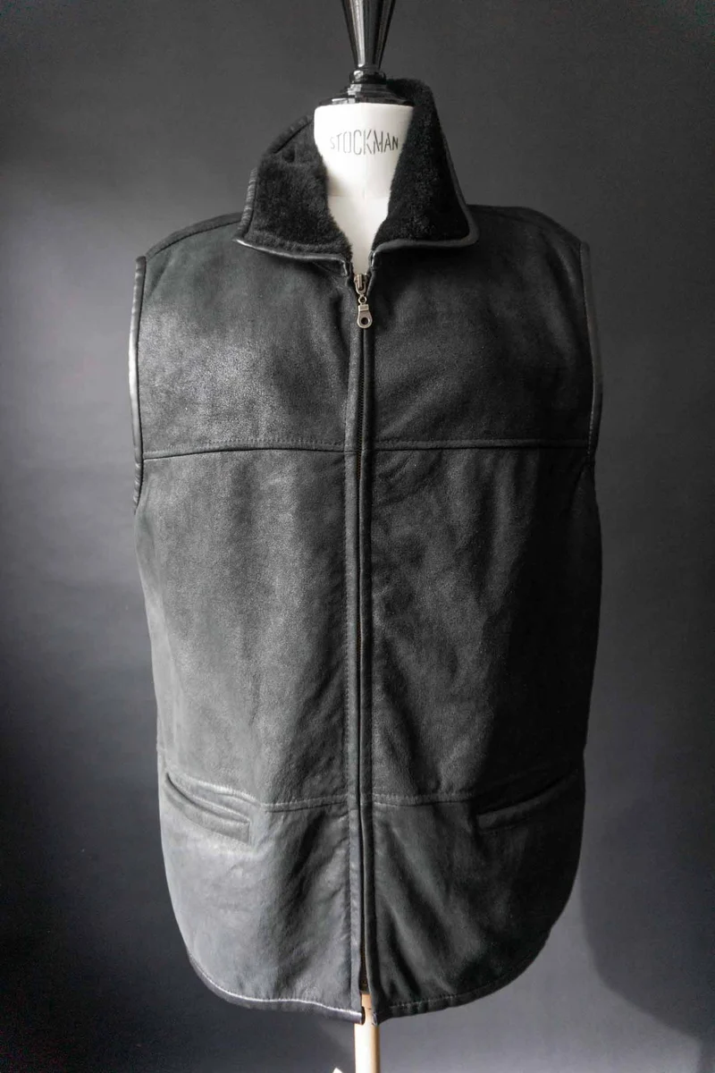 Vintage Echtlederweste mit Lammfellfutter, S–M