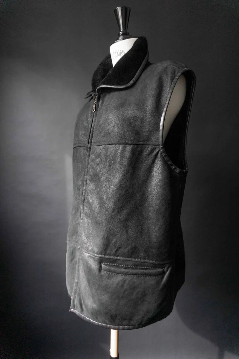 Vintage Echtlederweste mit Lammfellfutter, S–M