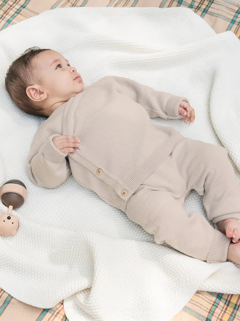 THE WOOLLY BABY JACKET - sand